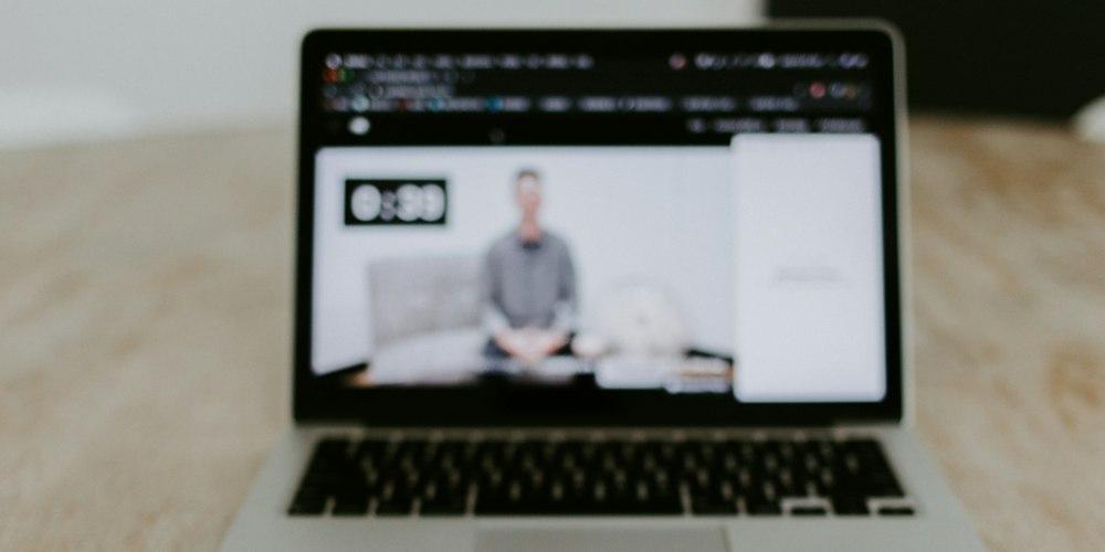 Online course playing on a laptop